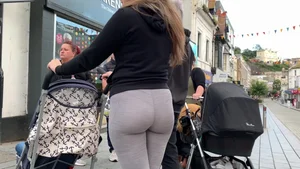 Sexy candid young milf with a sexy big booty and vpl in grey leggings