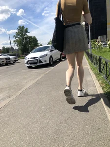 Candid Girl in a Skirt With Very Thin Hot Legs Walking on a Street Creepshots