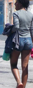 Black booty in denim shorts with slight vpl