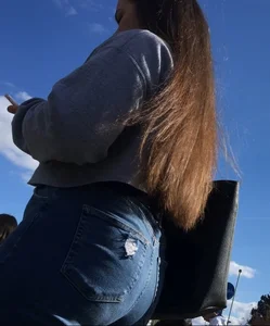 Long haired beauty teen with a tight ass in jeans