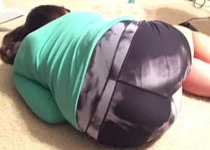 Girlfriend or sister laying down in spandex shorts with a nice ass