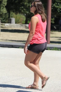 Thick girl in pink top and black shorts with vpl