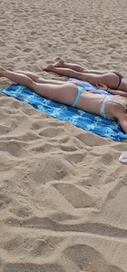 Two plump ass college babes face down ass up sunbathing in thong bikinis