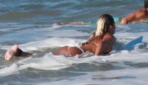Hot surfer chicks out in the water