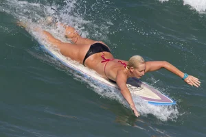 Candid surfer babes on the beach and in bikinis