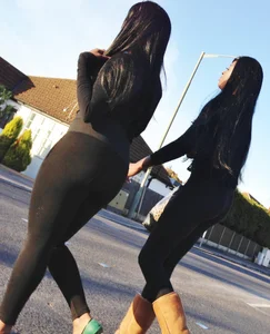 2 sexy black girls in leggings with nice asses