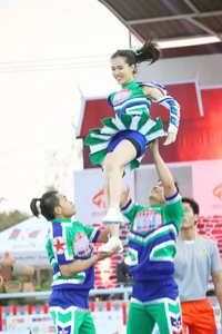 Bunch of athletic Thai cheerleaders at a competition