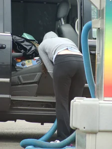 Girls cleaning their cars in jeans and pants