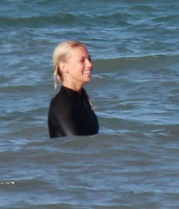 Hot surfer chicks out in the water