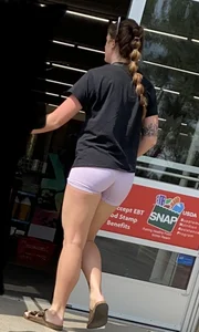 in purple Lycra shorts…