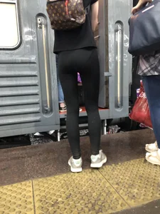Teen Girl in Tights And Sneakers Standing on the Train Platform VPL Photos