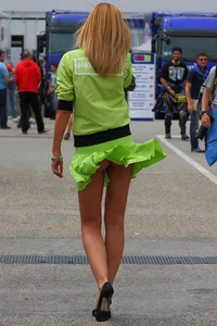 Girl with Her Dress Pulled Up by the Wind on the Street