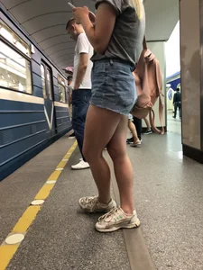 Girl with Hot Muscular Legs in Jeans Shorts Subway Creepshots
