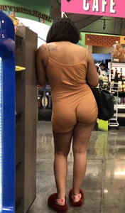 Latina with hard nipples and a big booty in tight spandex shorts outfit