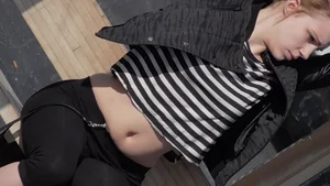 Strawberry blonde cutie showing stomach and in leggings