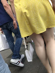Hot blonde candid chick wearing a yellow dress street creepshots