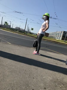 Nice candid girl wearing tight grey sweatpants, a mask and a hat