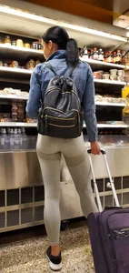 Beautiful brunette shopping in tight grey spandex with a great ass