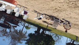Blonde beach girl with a great ass in pink thong bikini