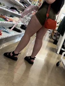 Juicy brunette in green spandex shorts OC