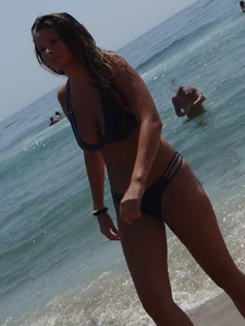 Beach girl with a nice ass and tits in blue bikini