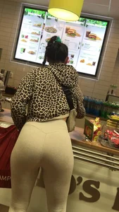 Brunette babe with a great ass in tight grey leggings
