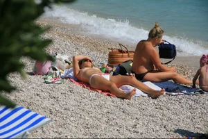 Nude beach girls in Baska, Croatia