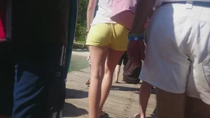 Milf in yellow shorts with vpl and a wedgie
