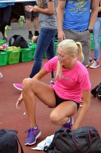 Sexy blonde track sprinter changing after a race