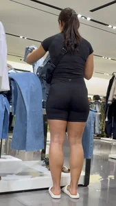 Girl Wearing Black Top And Tight Black Shorts (Upshots)