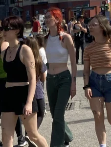 A Group of Teens Street Photos, a Tall Glasses-Wearing Red-Headed Teen in a Top With Nice Abs