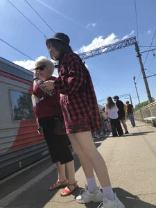 Cute candid teen on a train platform