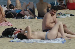 Topless girls on a beach in Barcelona