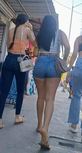 super sexy denim short shorts on this brunette with tremendous legs and big butt