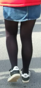 Girl out in denim skirt and tight stockings with nice legs