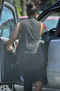 Chubby black lady with big tits and no bra lets it slip