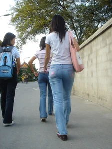Cute Asian girl with a nice booty in tight jeans