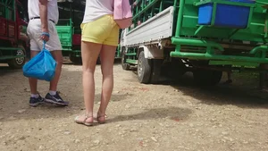 Milf in yellow shorts with vpl and a wedgie