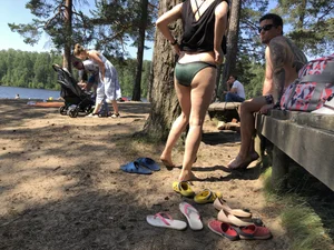 Candid Girl Putting On Swimsuit and Undressing at the Forest Lake Beach Gallery