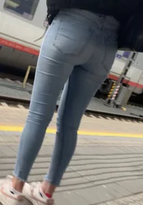 Tight jeans ass at train station