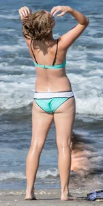 Sexy beach blonde snorkeling in bikini