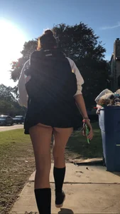 Girl Walking up the Stairs in a Skirt Candid