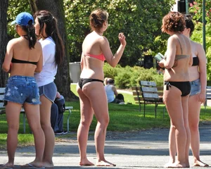 Group of sexy girls in bikinis at the beach
