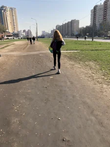 Skinny Gigh in Tight Leggings Walking Down the Suburban Street City Candid