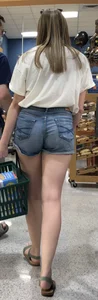 Blondie in jean shorts at the market