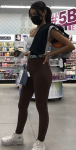 Slim latina in light brown leggings