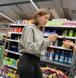 Slim girl with good body in black leggings