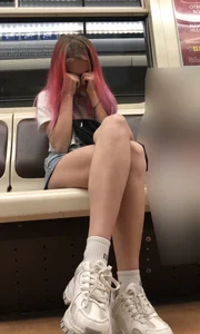 Girl With Pink Hair and Hot Legs in Denim Shorts in the Subway Train Candid Photo Gallery