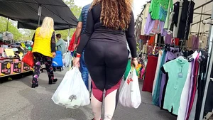 Milf with a tremendous hot ass in the market