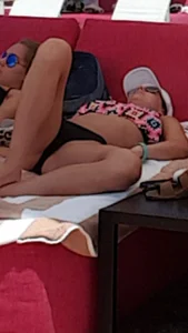 Bikini Brunette Laying Down